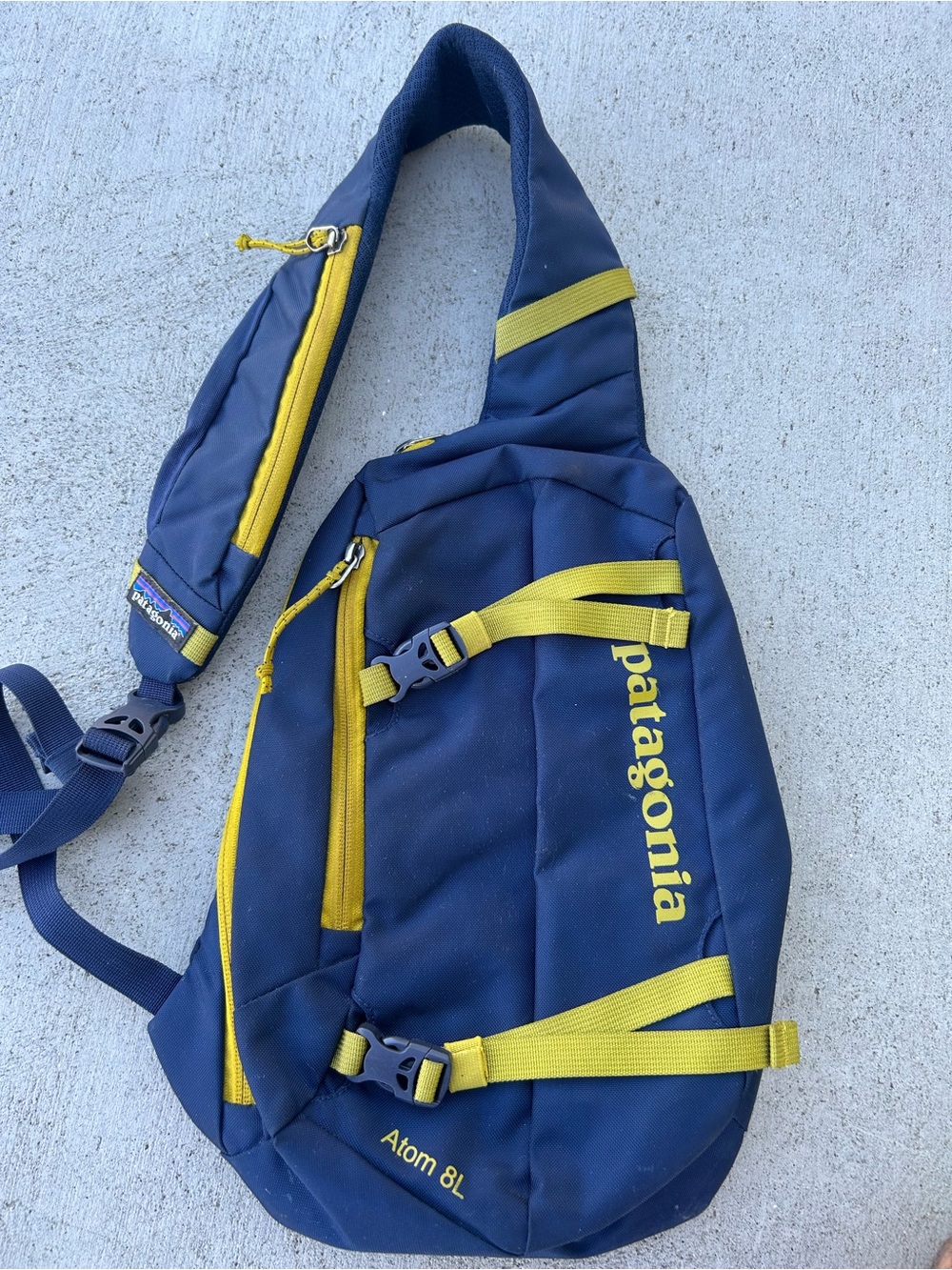 Patagonia ATOM 8L Navy and Yellow Sling Pack